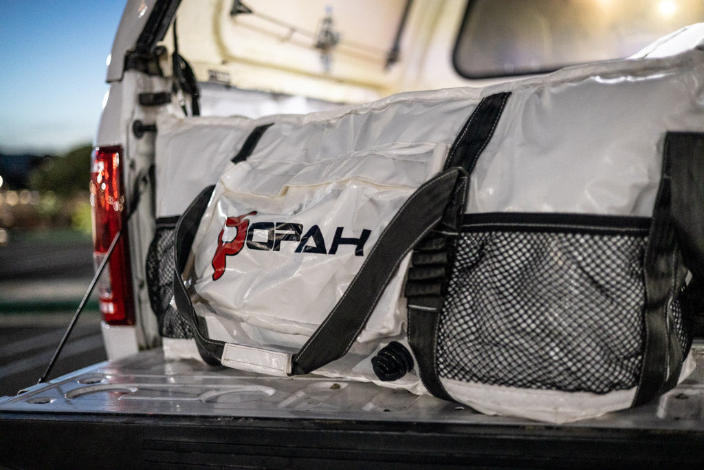 Opah Fathom 4 fish cooler bag on the bag of a pickup truck